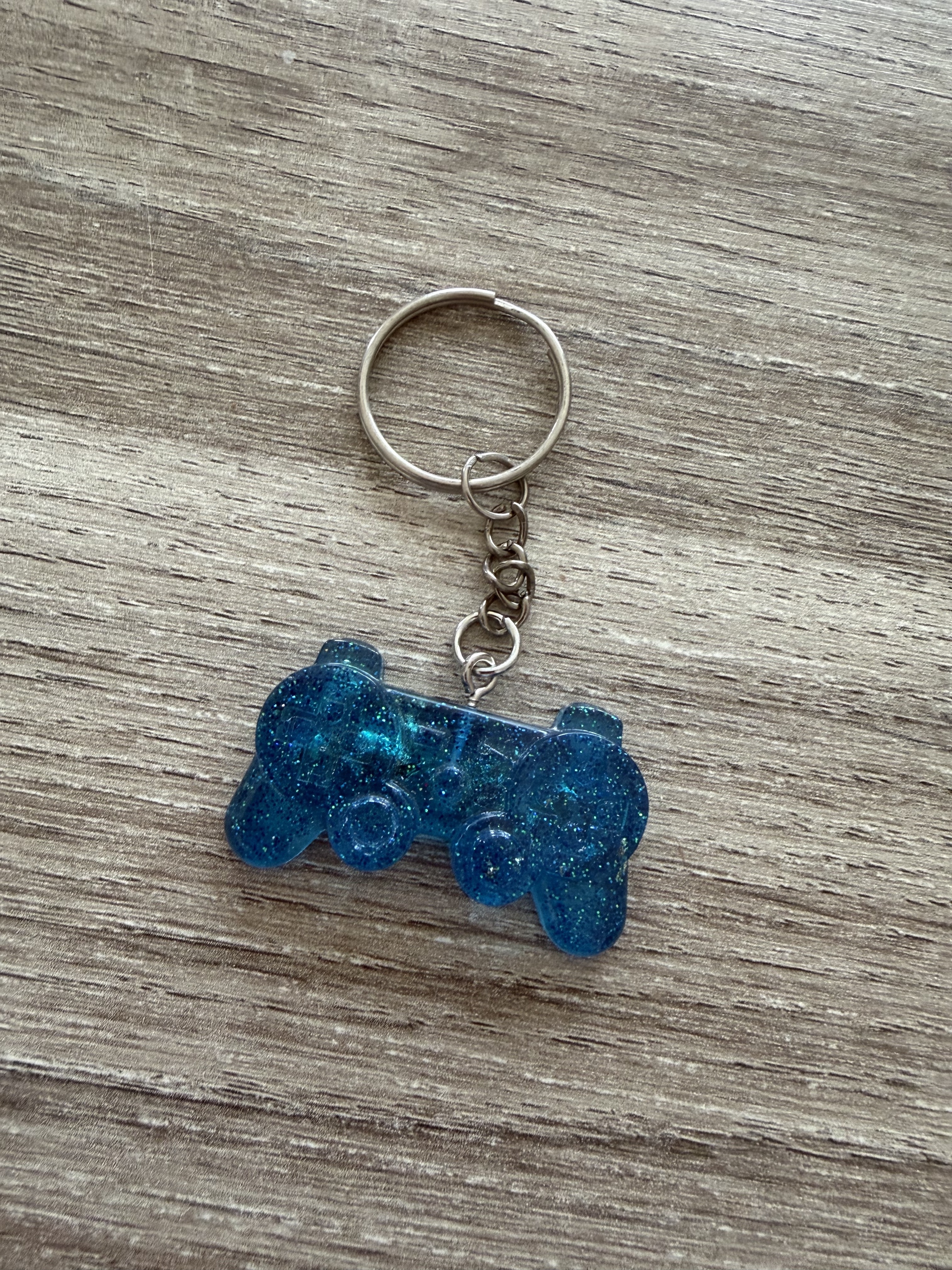 Porte clé manette 2 bleu feuille d'or