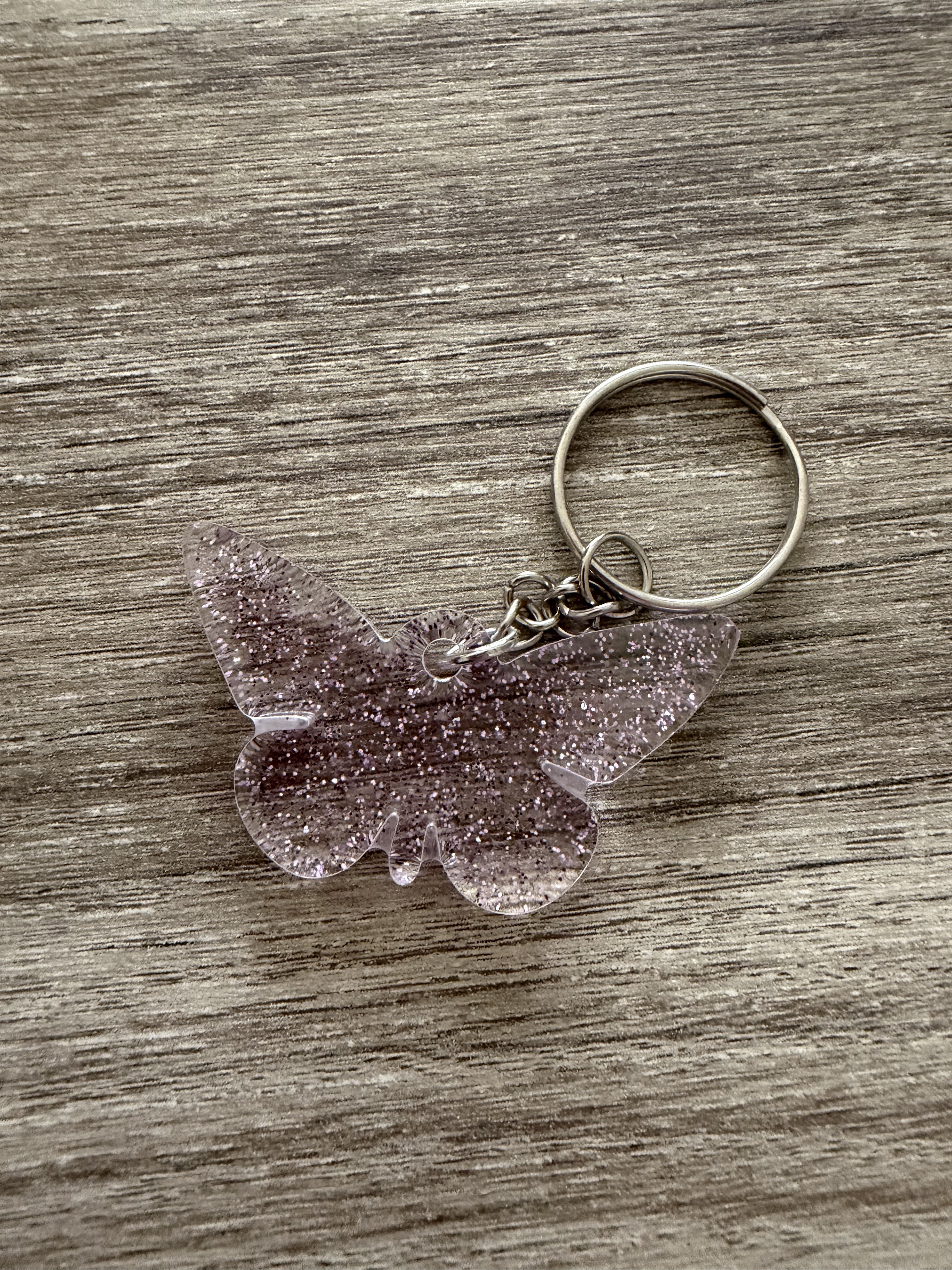 Porte clé papillon paillette fine violette