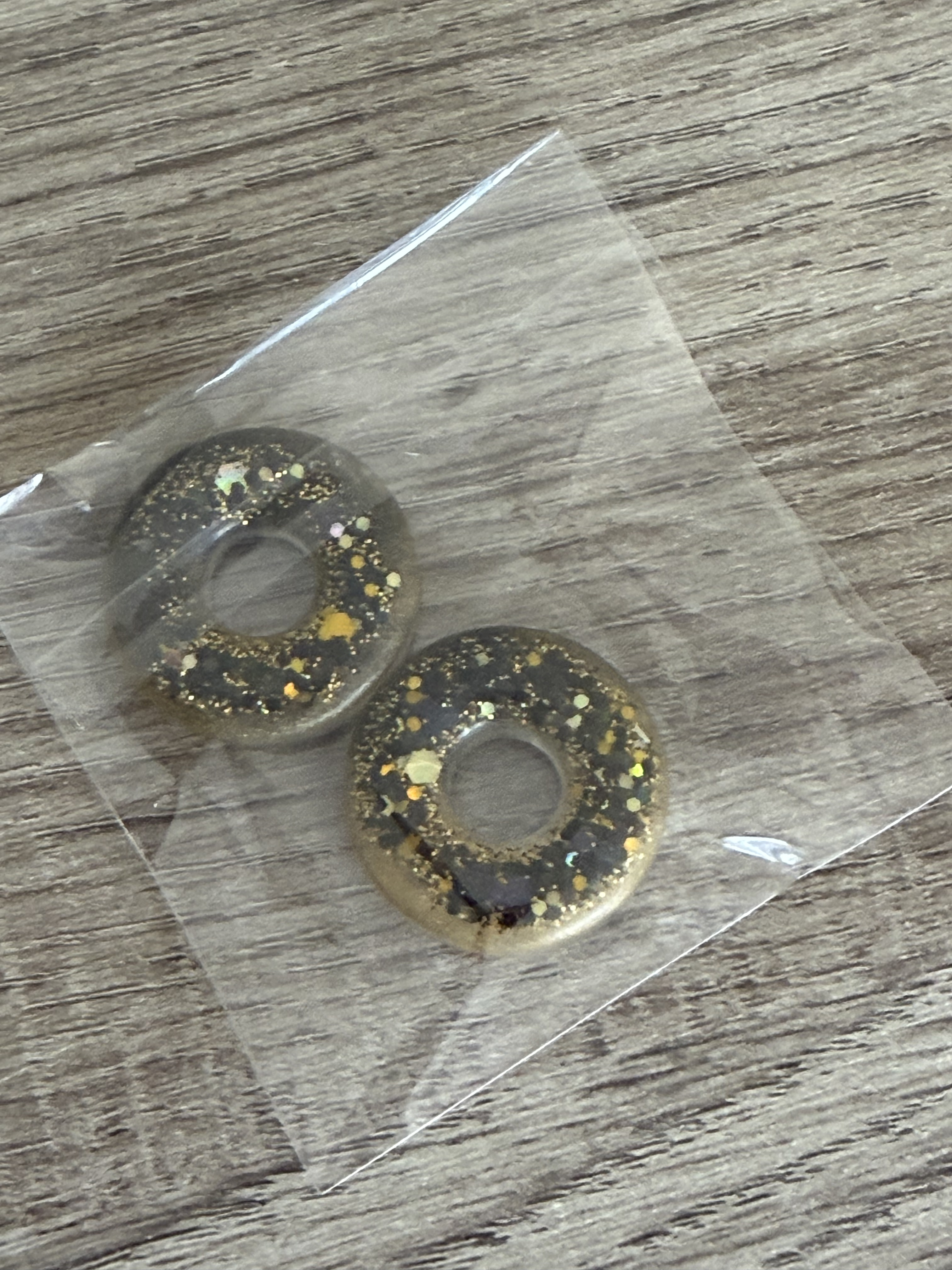 Pampilles donut noir et doré avec paillettes