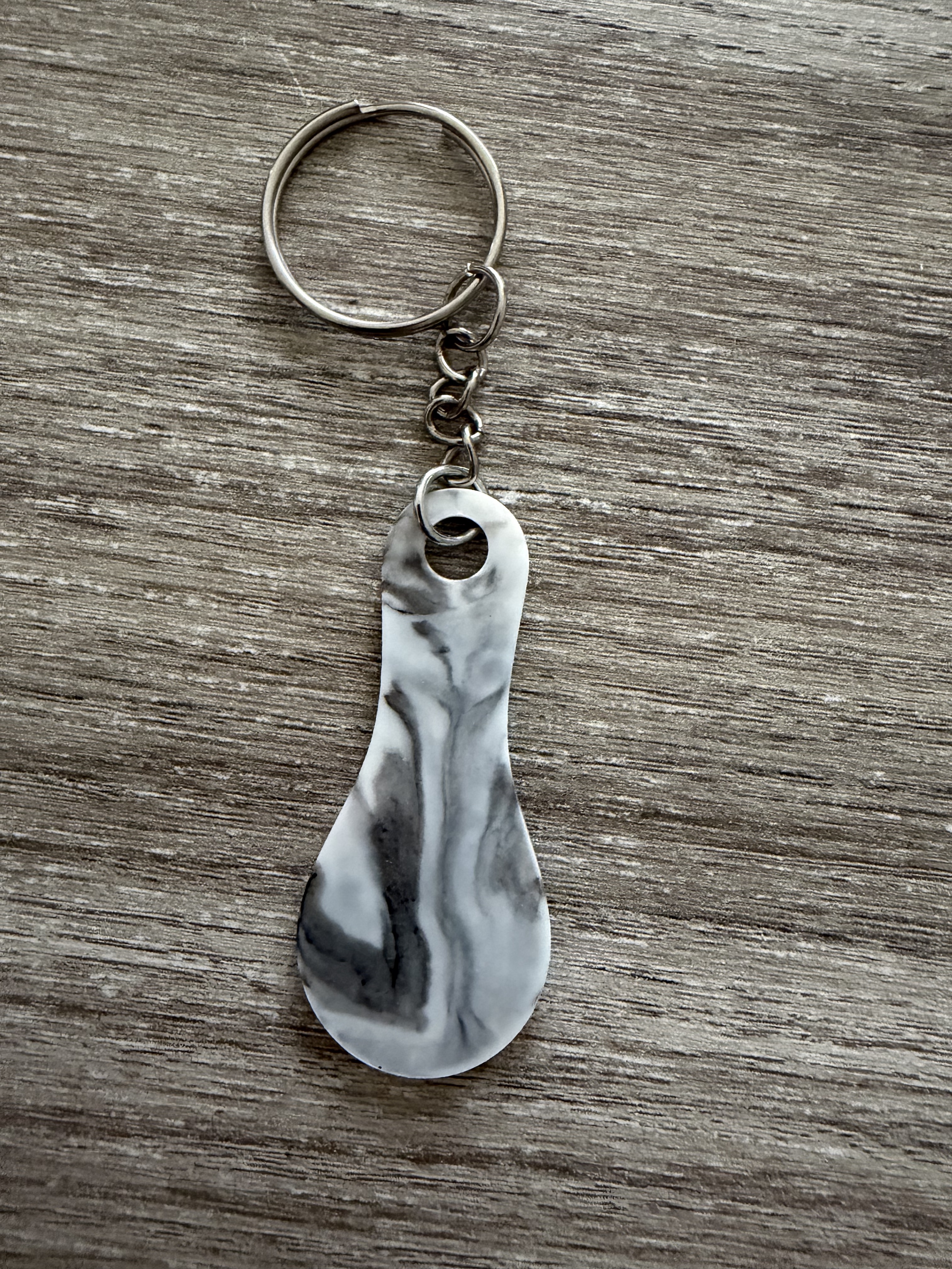 Porte clé jeton gris et blanc