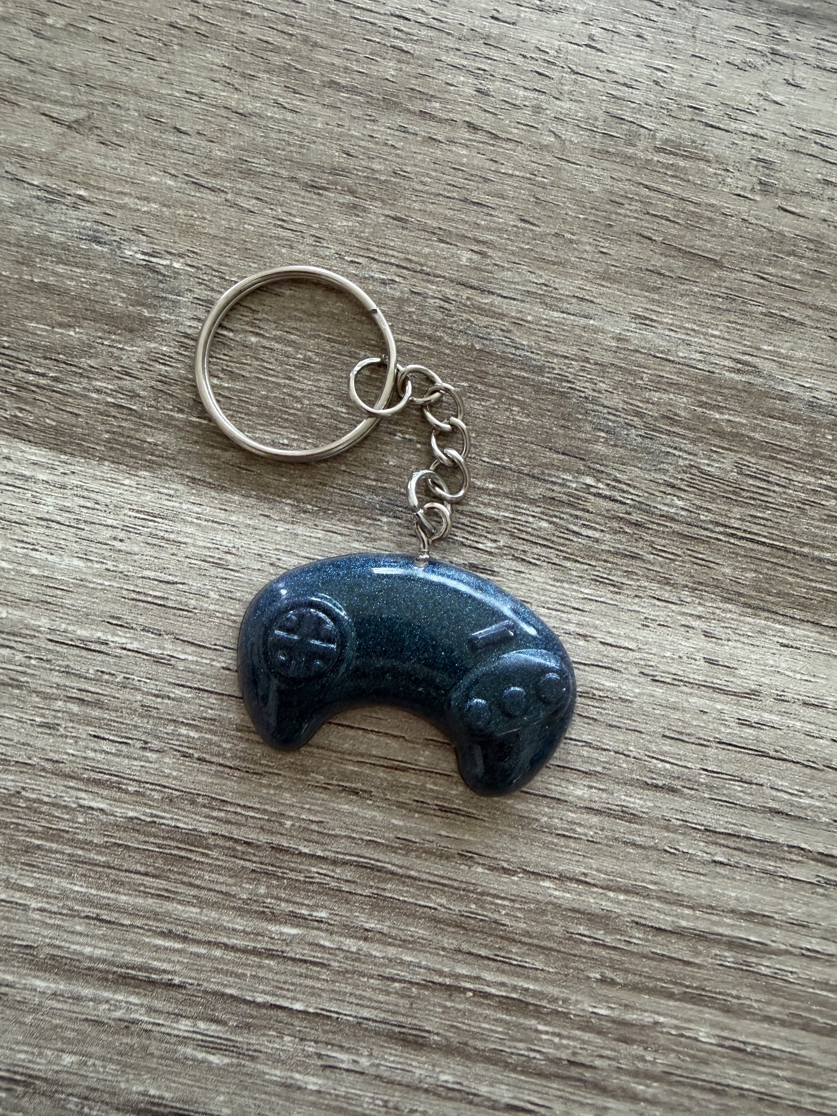 Porte clé manette 1 bleu métallisé