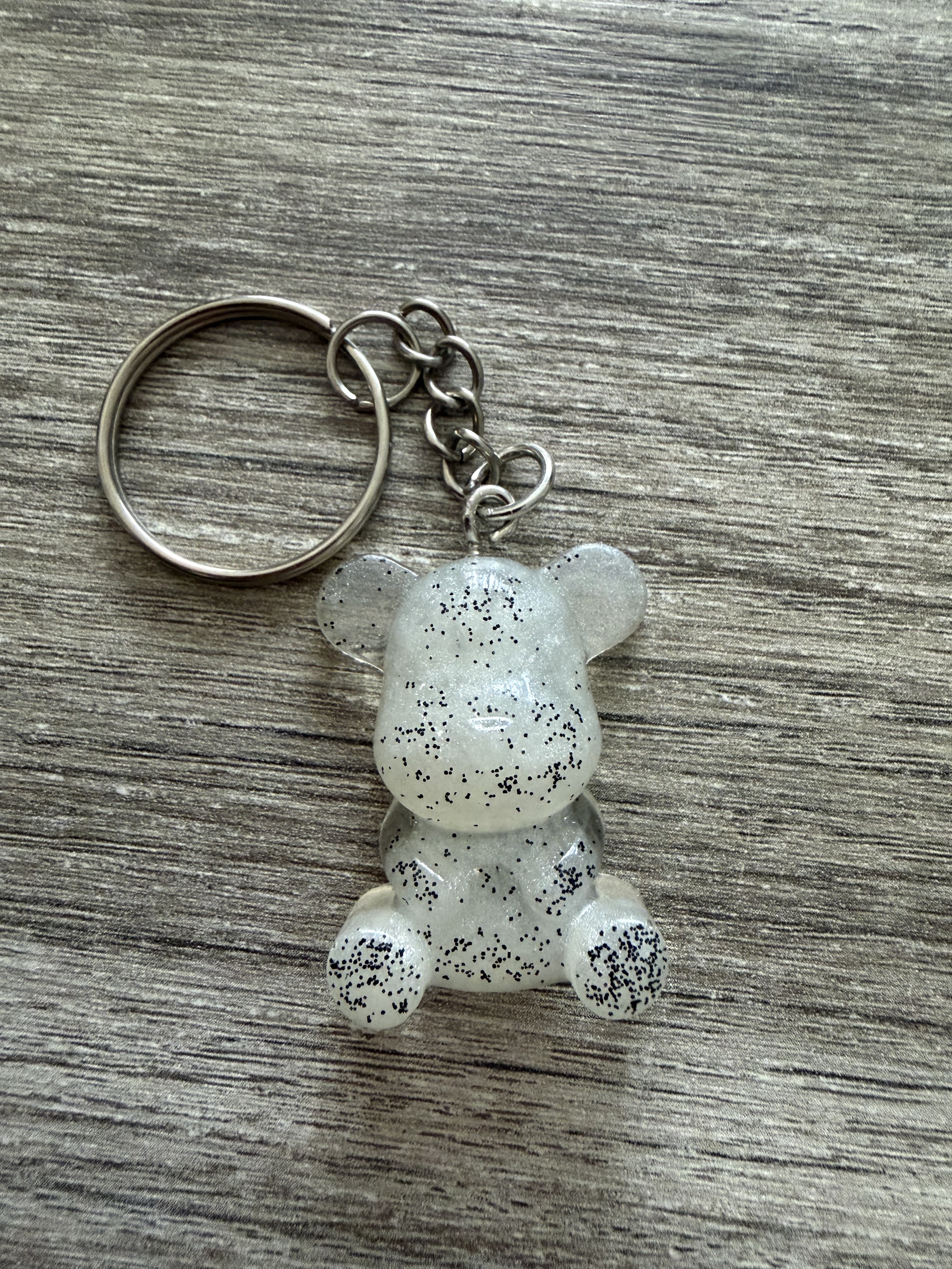 Porte clé ourson 35mm blanc paillette noire