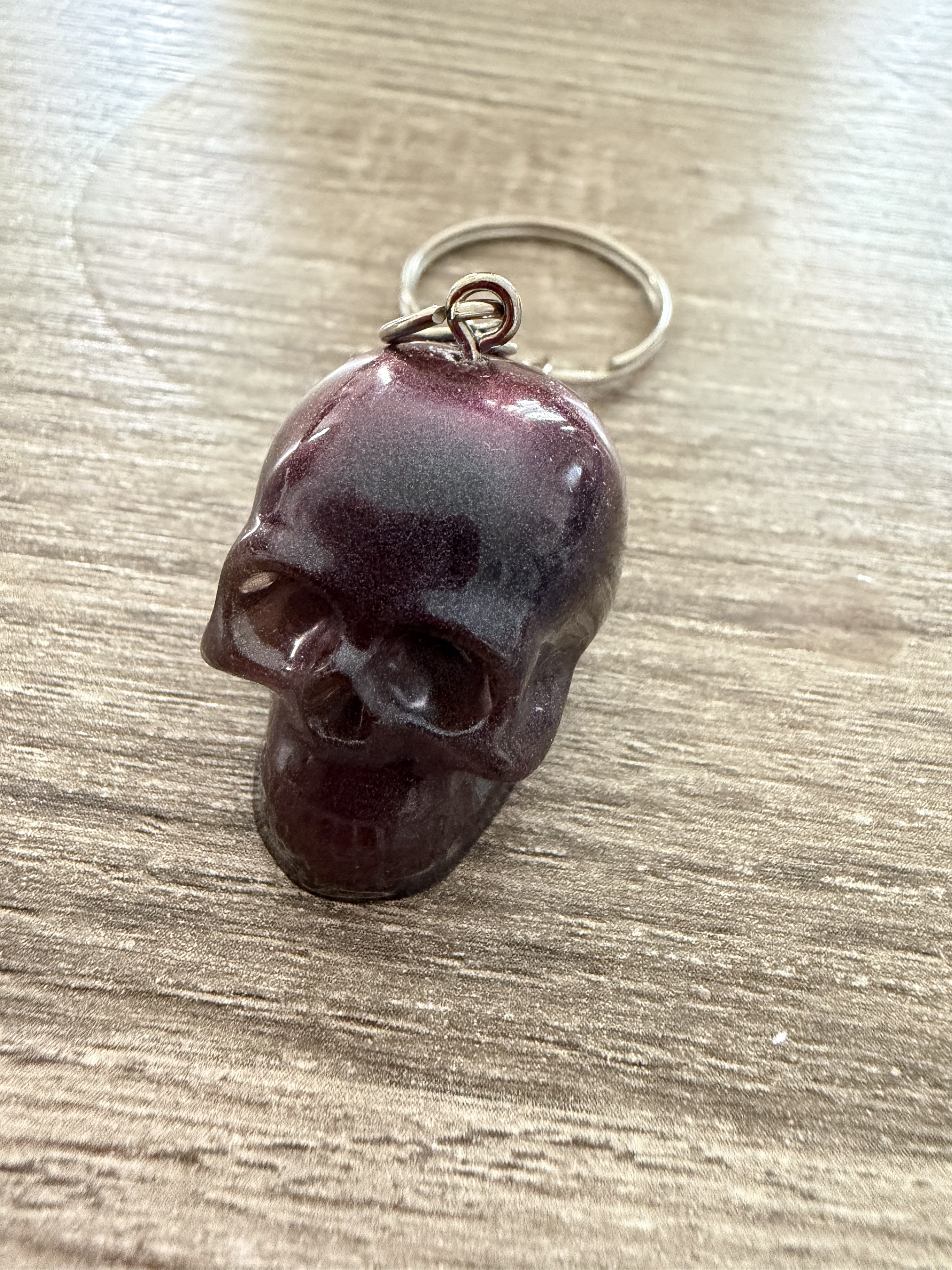 Porte clé tête de mort raisin