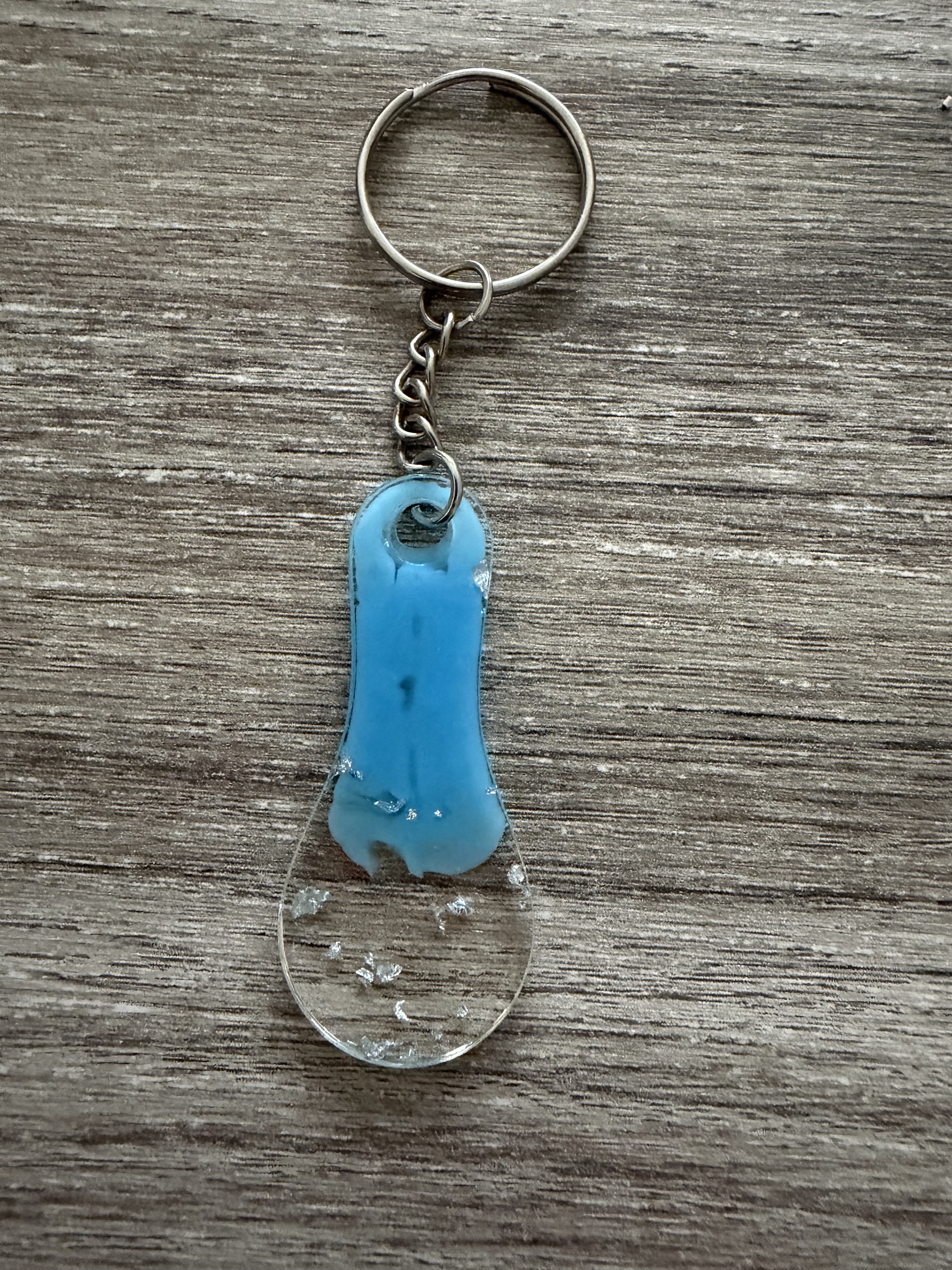 Porte clé jeton bleu feuille argent