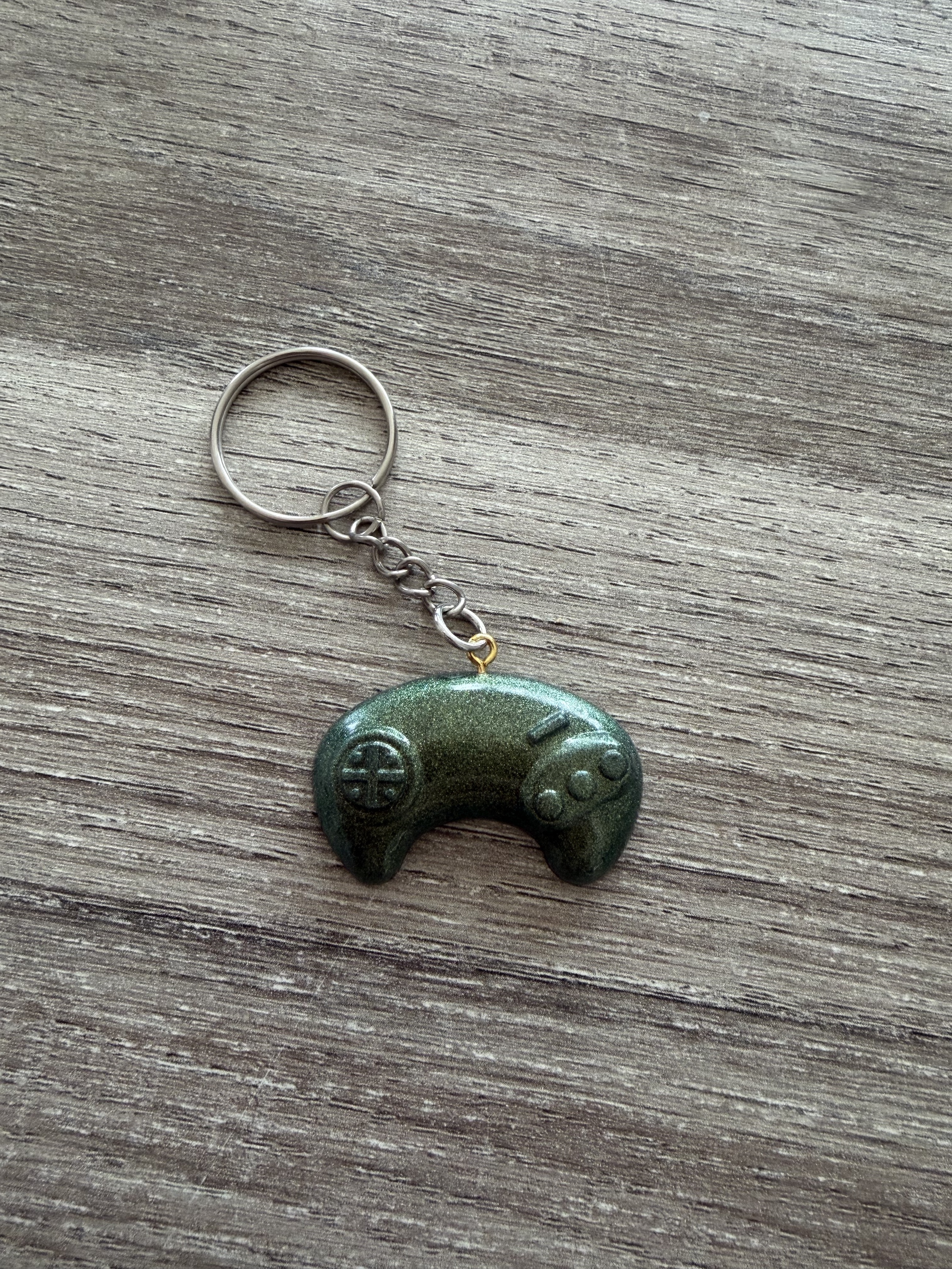 Porte clé manette 1 vert métallisé