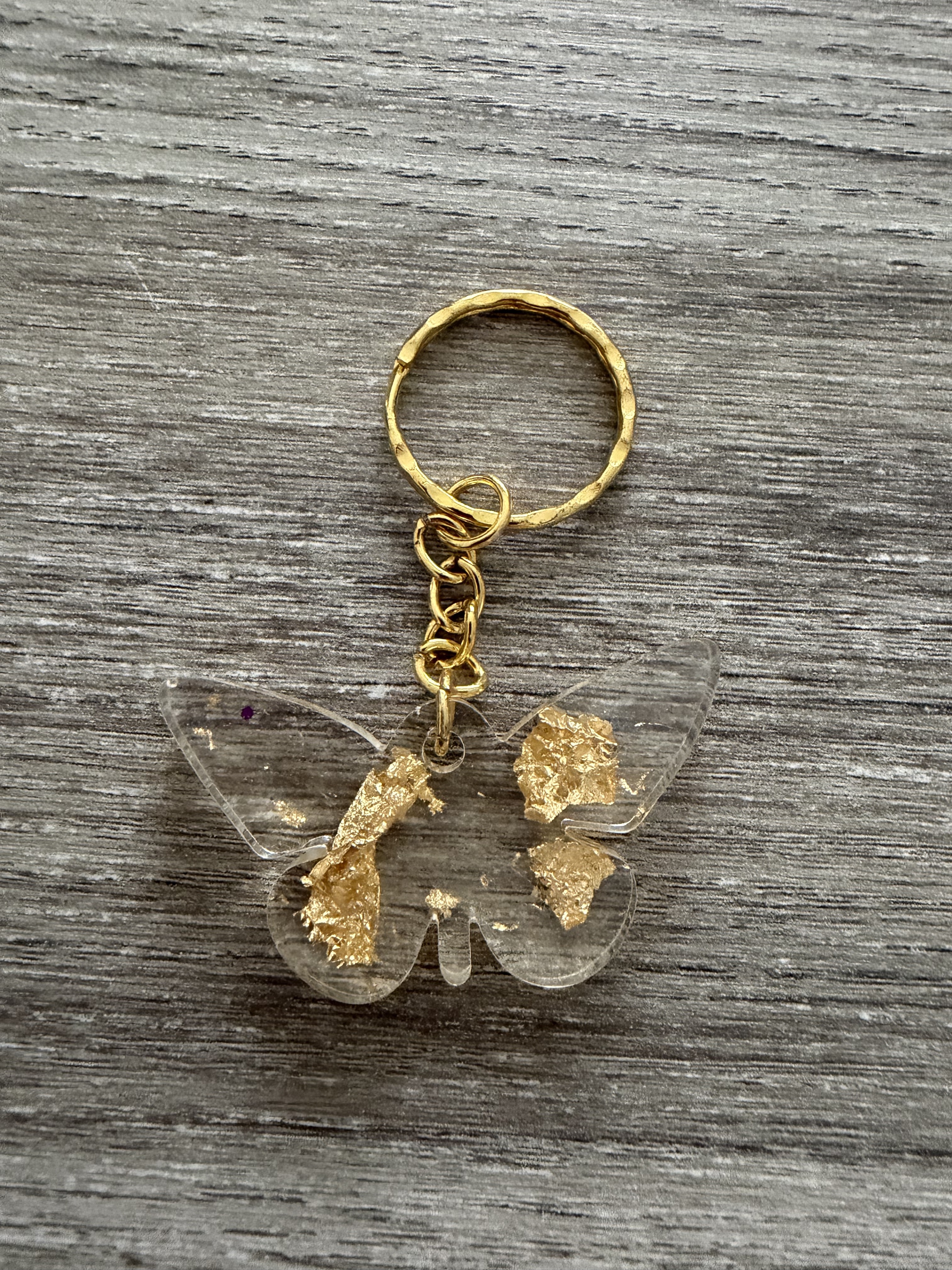 Porte clé papillon feuille d'or