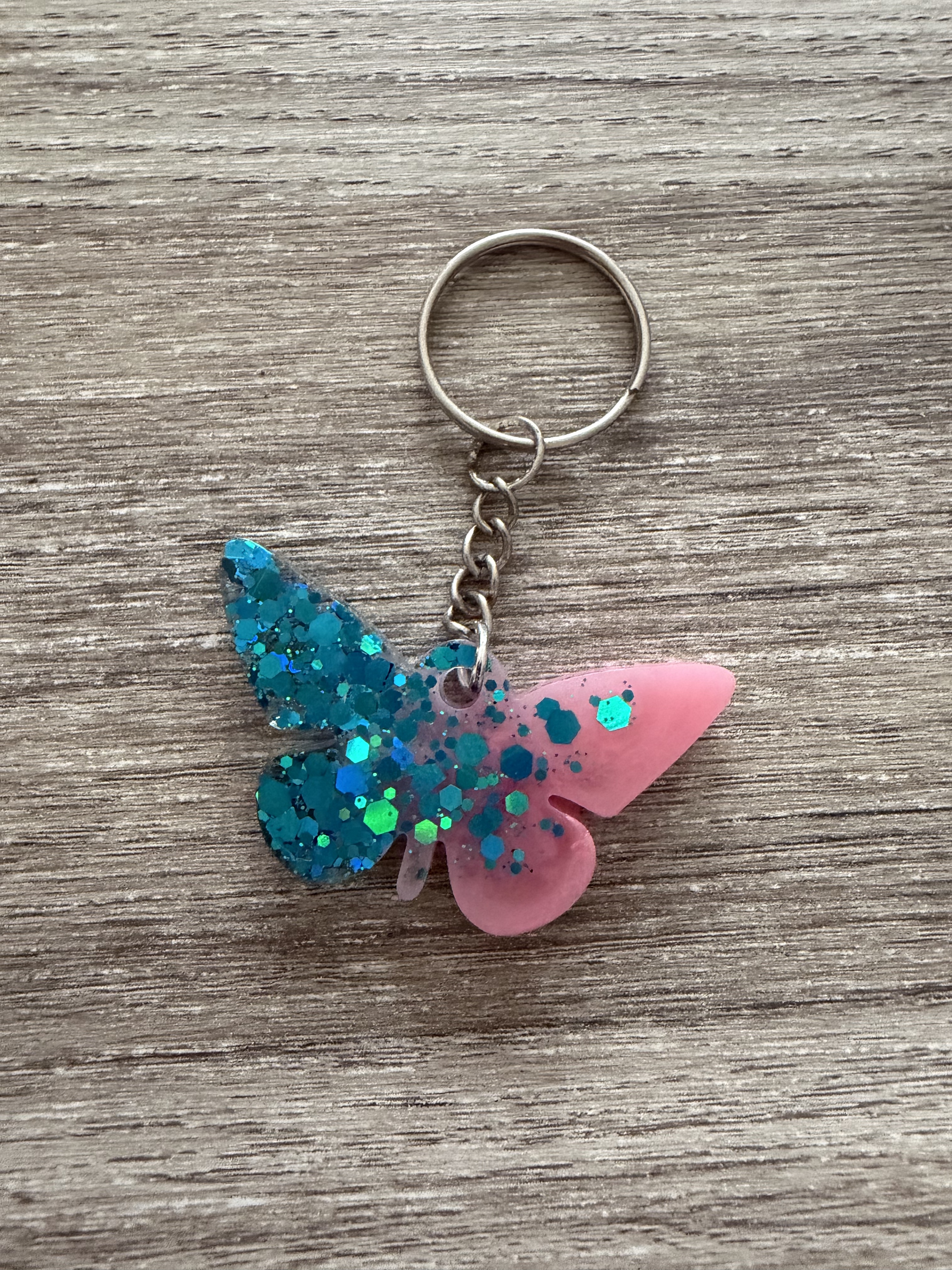 Porte clé papillon rose paillette bleue