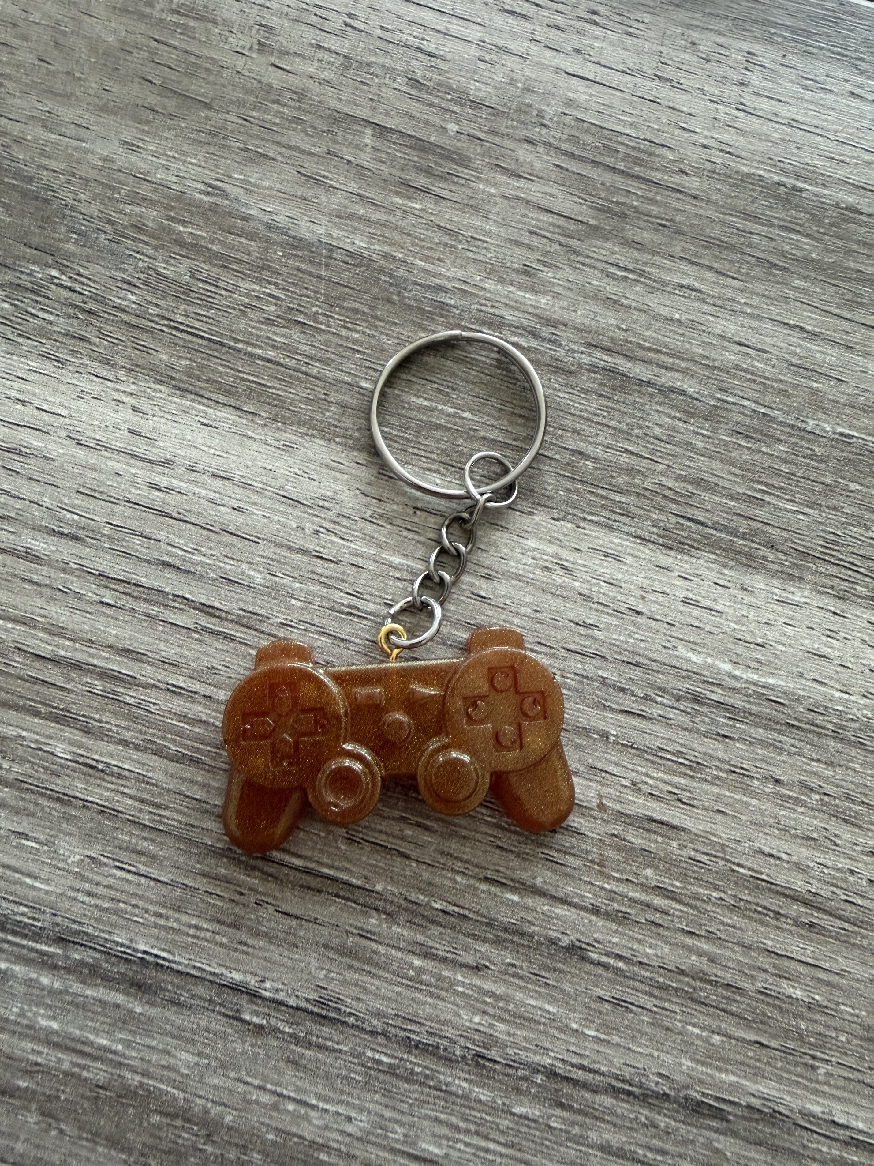 Porte clé manette 2 champagne