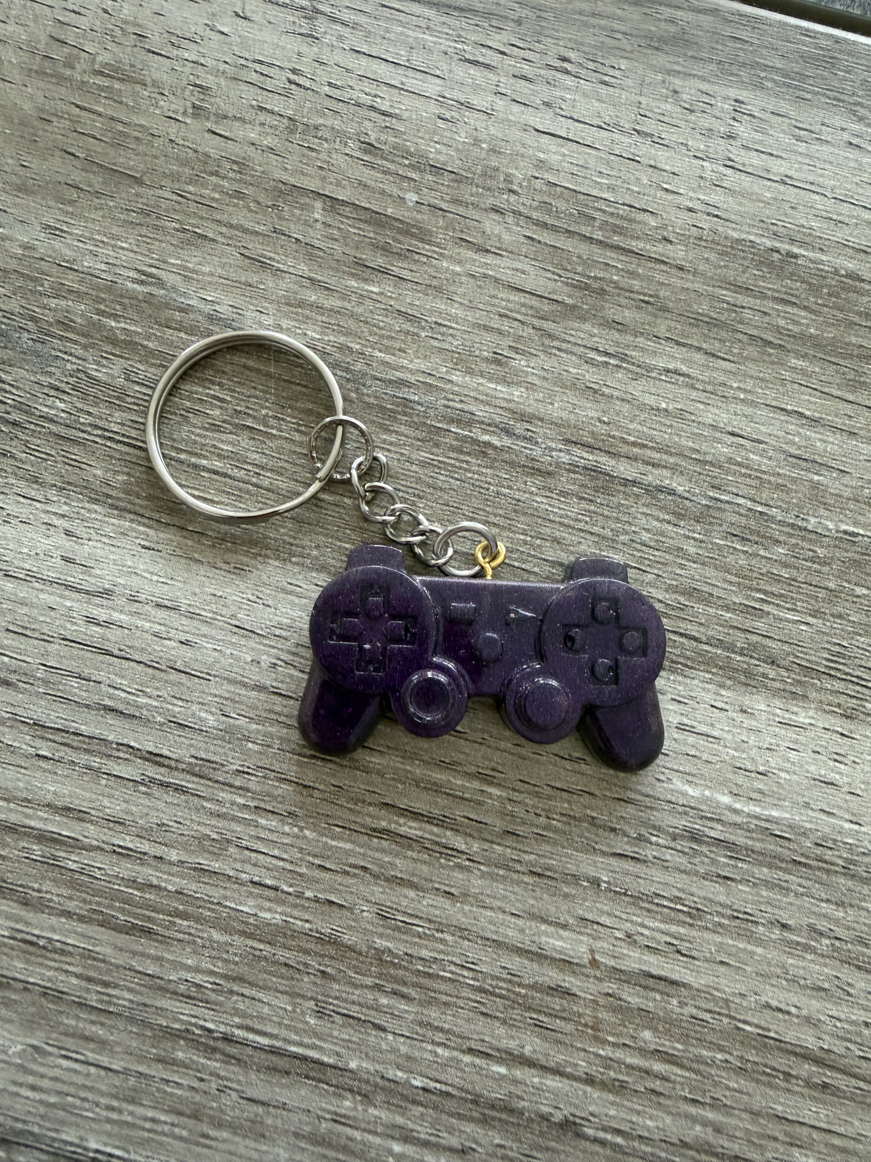 Porte clé manette 2 violet métallisé