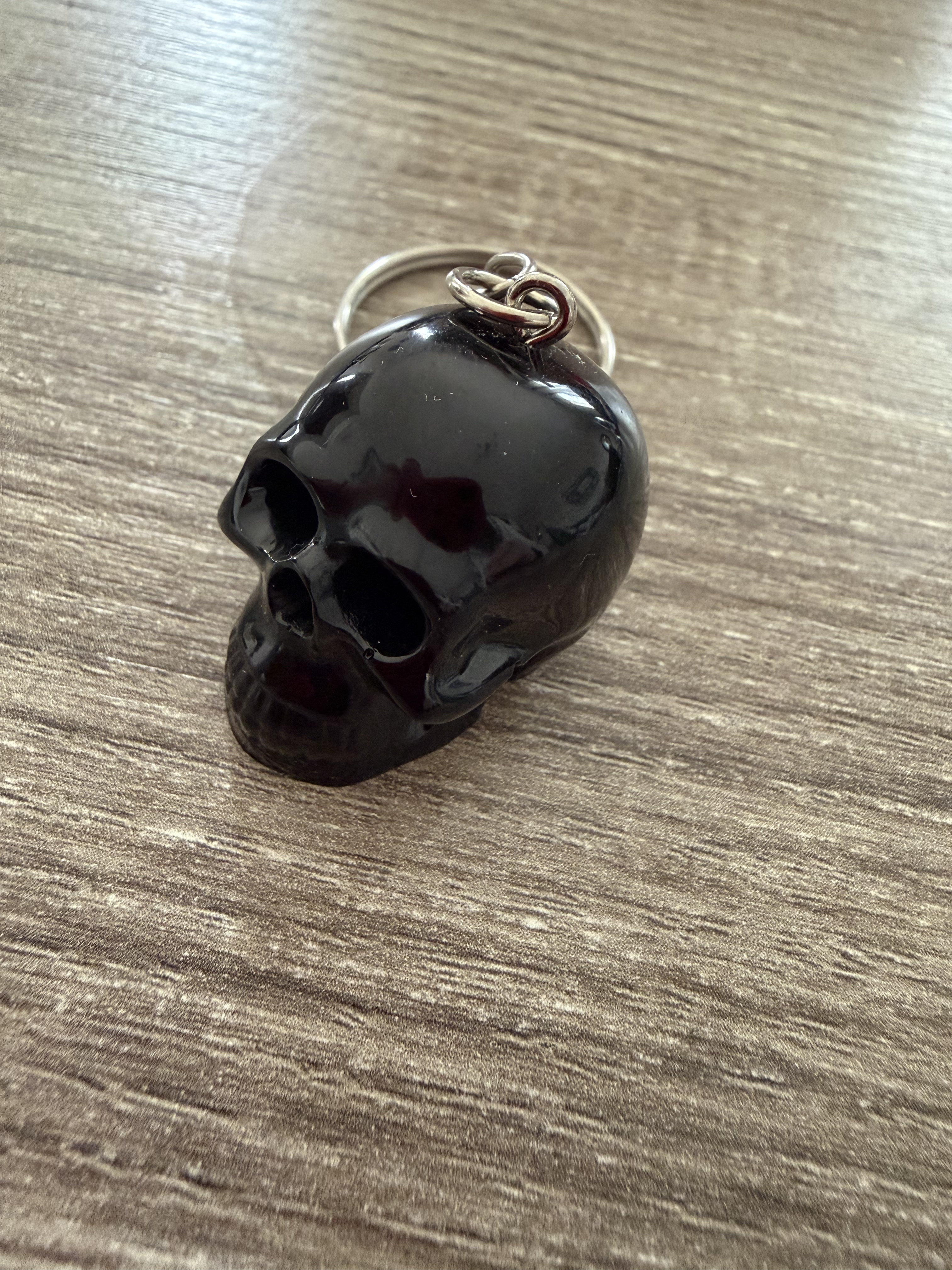 Porte clé tête de mort noir